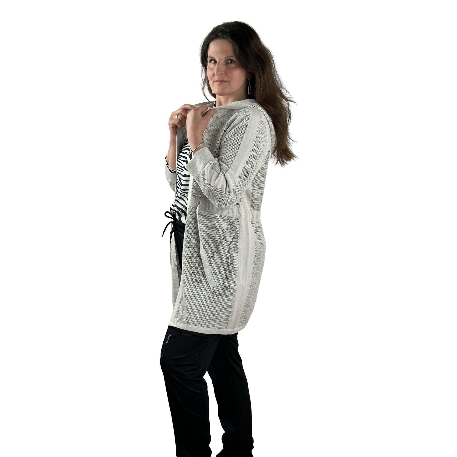 Long cardigan with rhinestones. Fashion by Monari