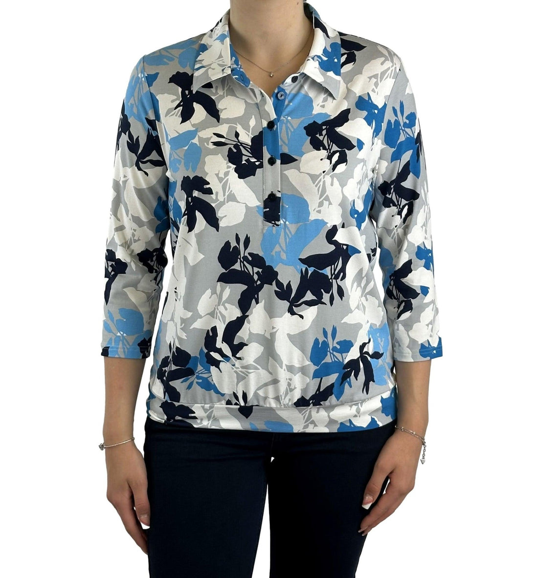 Poloshirt mit floralem Allover-Print. Mode von Frank Walder